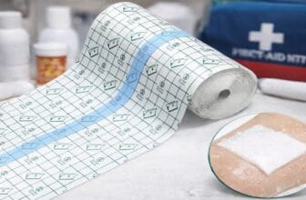 First-aid essentials and adhesive bandage close-up