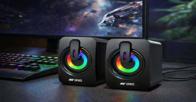 RGB gaming speakers in a dark setup